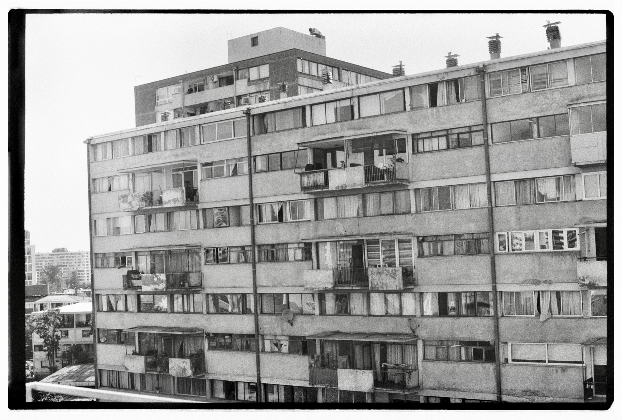 Black and white analogue photograph of a residential building in Santiago de Chile